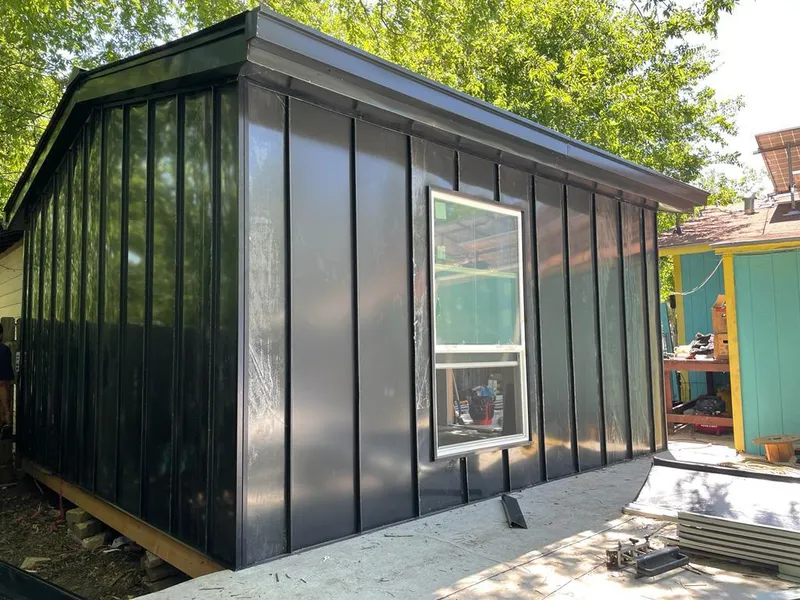 Black standing seam metal wall panels for Roof Inspection in Rye Brook